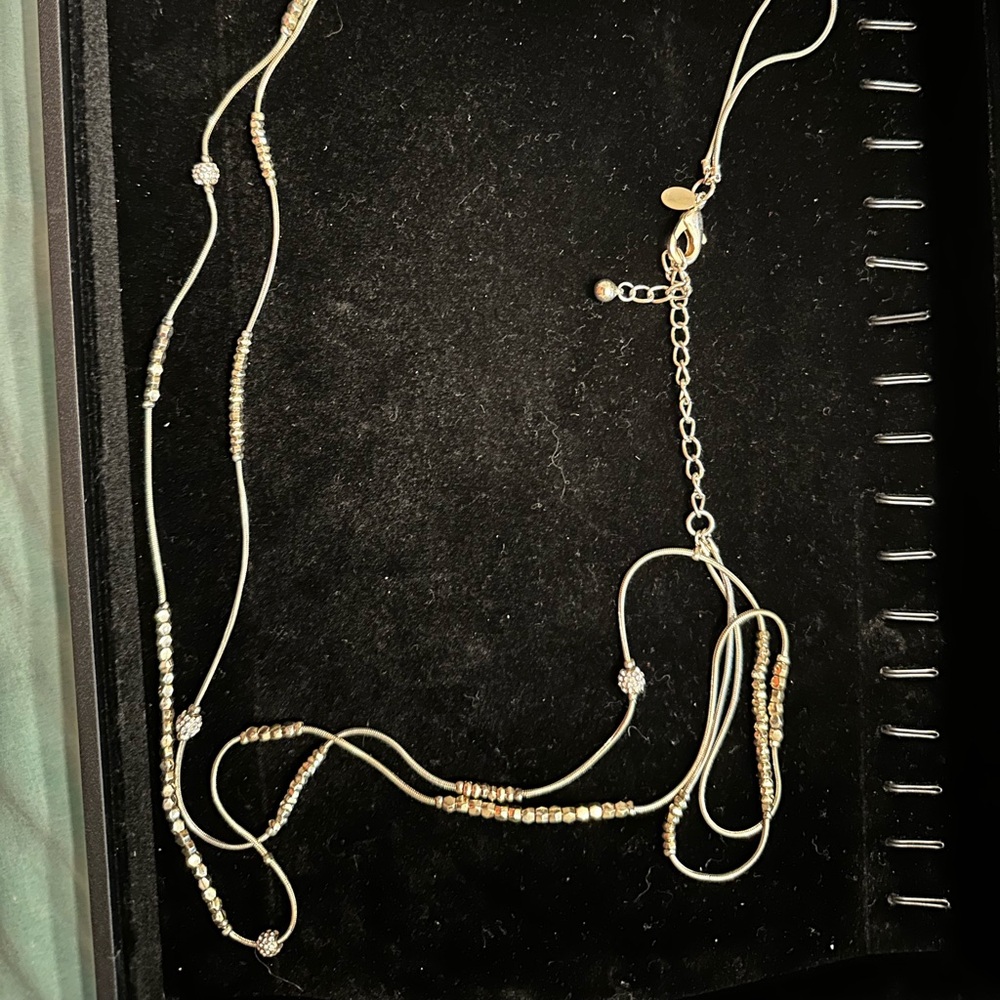 Chicos gold multi layer necklace
40 inches with a 4.5 inch extension